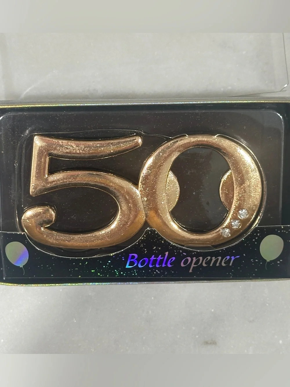 50th Celebration Gold Bottle Opener giveaway to guests
